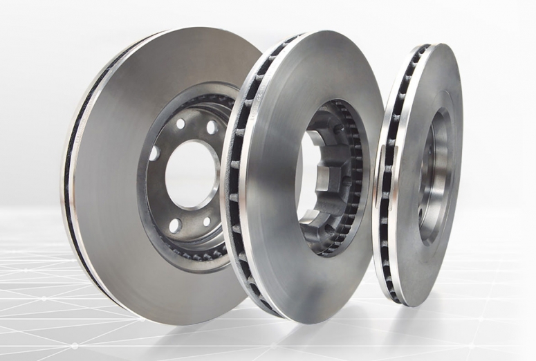 What are the symptoms of warped brakes on a car?
